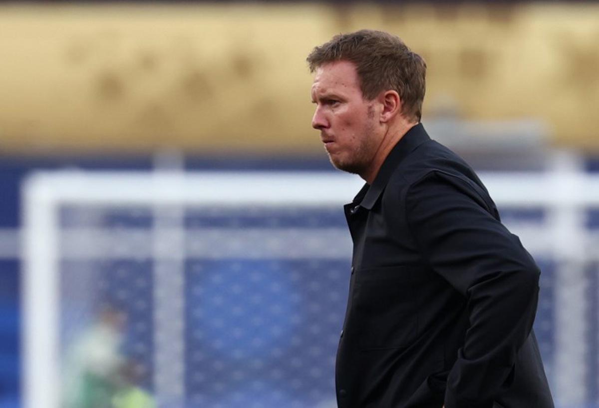 (FILES) Germany's head coach Julian Nagelsmann reacts after losing the penalty shootout during the 2026 World Cup round of 32 football match between Germany and Paraguay at the Boston Stadium in Foxborough on June 29, 2026. Germany coach Julian Nagelsmann has resigned following his team's shock last-32 exit from the World Cup at the hands of Paraguay, several media reported on Juli 3, 2026. Nagelsmann, who was under contract until the 2028 European Championship, has accepted the German Football Federation's (DFB) request for him to step down, Bild and Sky Germany reported. FRANCK FIFE / AFP