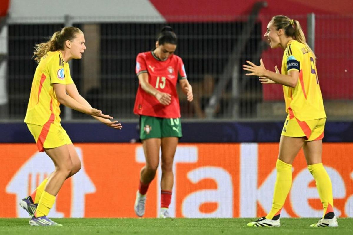 Portugal's midfielder #13 Fatima Pinto (C) looks dejected as Belgium's midfielder #08 Jarne Teulings and Belgium's forward #09 Tessa Wullaert react after a Portugal goal was disallowed during the UEFA Women's Euro 2025 Group B football match between Portugal and Belgium at the Stade de Tourbillon in Sion, on July 11, 2025. Fabrice COFFRINI / AFP
