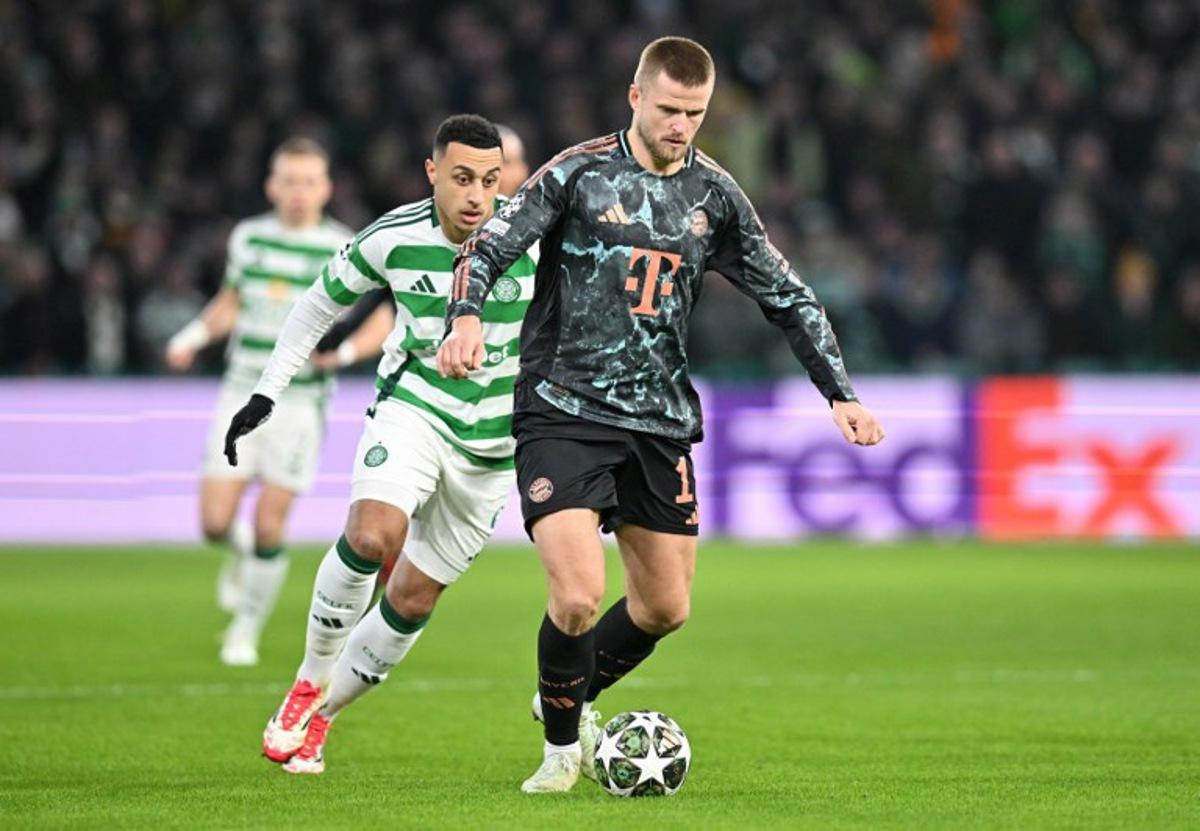 Celtic's Irish striker #09 Adam Idah (L) vies wqith Bayern Munich's English defender #15 Eric Dier during the UEFA Champions League play-off first leg football match between Celtic and Bayern Munich at Celtic Park stadium in Glasgow, Scotland on February 12, 2025. ANDY BUCHANAN / AFP