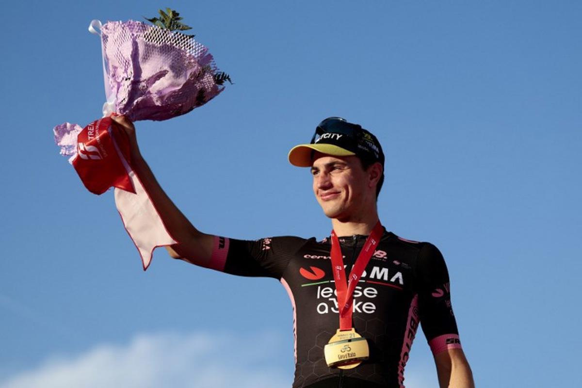 Team Visma-Lease a Bike's Dutch rider Olav Kooij celebrates on the podium after winning the 21st and last stage of the 108th Giro d'Italia cycling race of 143kms from Rome to Rome on June 1, 2025. Luca Bettini / AFP