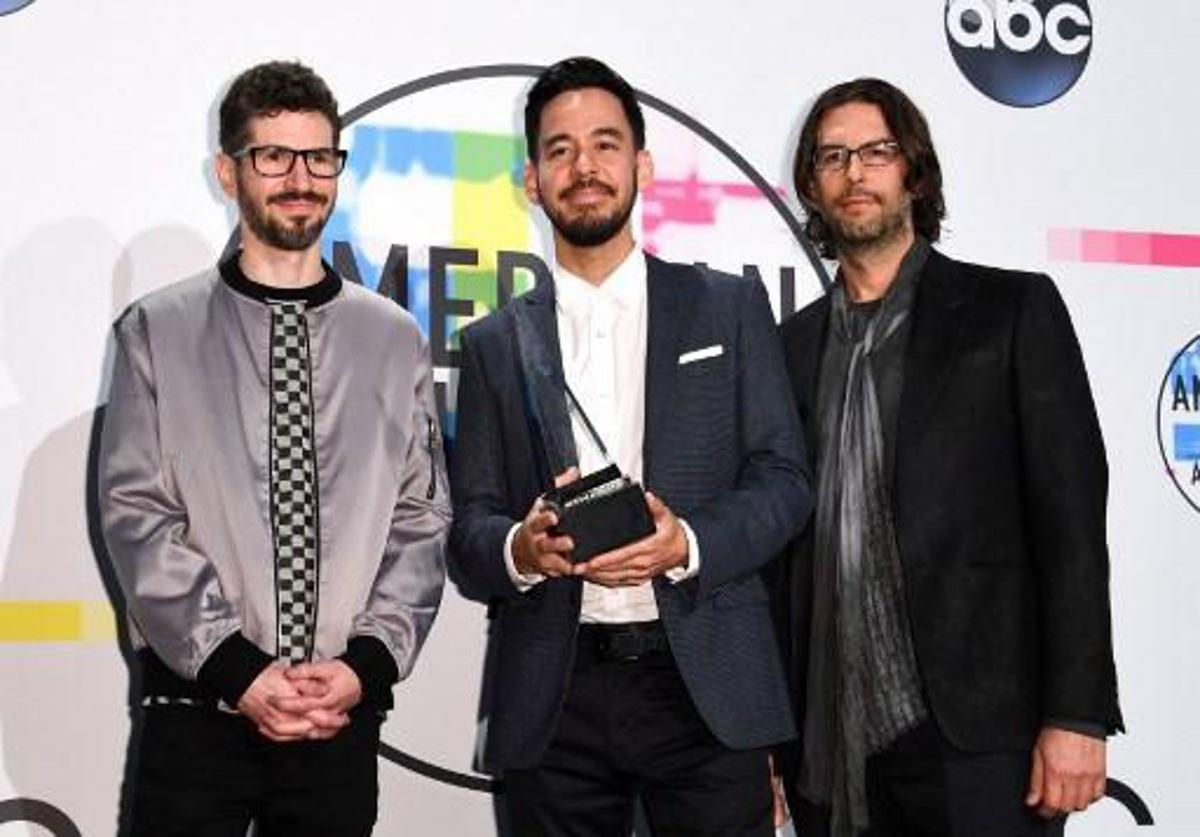 American Music Award for Favorite Alternative Rock Artist winners (L-R) Brad Delson, Mike Shinoda and Rob Bourdon of Linkin Park attend the Press Room at the 2017 American Music Awards, on November 19, 2017, in Los Angeles, California. VALERIE MACON / AFP