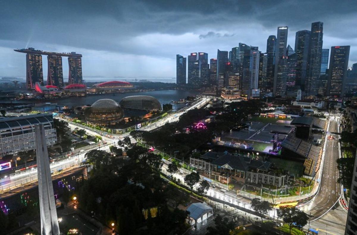 This photo shows the road circuit illuminated for the the upcoming Formula One Singapore Grand Prix at the Marina Bay Street Circuit in Singapore on October 1, 2025. Roslan RAHMAN / AFP