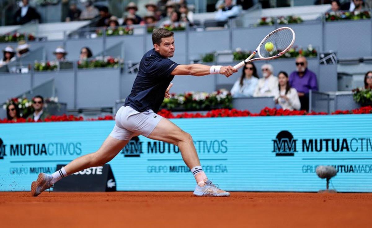 Belgium's Alexander Blockx returns the ball to Norway's Casper Ruud during their 2026 ATP Tour Madrid Open tennis tournament quarter-final singles match at the Caja Magica in Madrid, on April 30, 2026. Thomas COEX / AFP