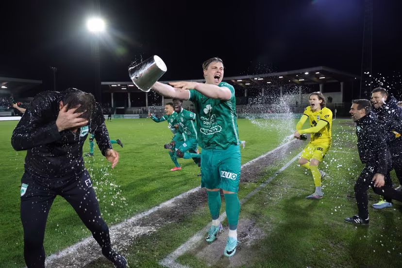 RAAL's head coach Frederic Taquin and RAAL's Jorn Vancamp celebrate after winning a match between RAAL La Louviere and Jong Gent (KAA Gent), in the Belgian National Division 1 (Eerste Nationale), in La Louviere, Saturday 20 April 2024. BELGA PHOTO VIRGINIE LEFOUR