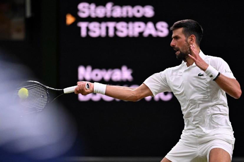 Serbia's Novak Djokovic returns the ball to Greece's Stefanos Tsitsipas during their men's singles second round tennis match on the third day of the 2026 Wimbledon Championships at The All England Lawn Tennis and Croquet Club in Wimbledon, southwest London, on July 1, 2026. Kirill KUDRYAVTSEV / AFP