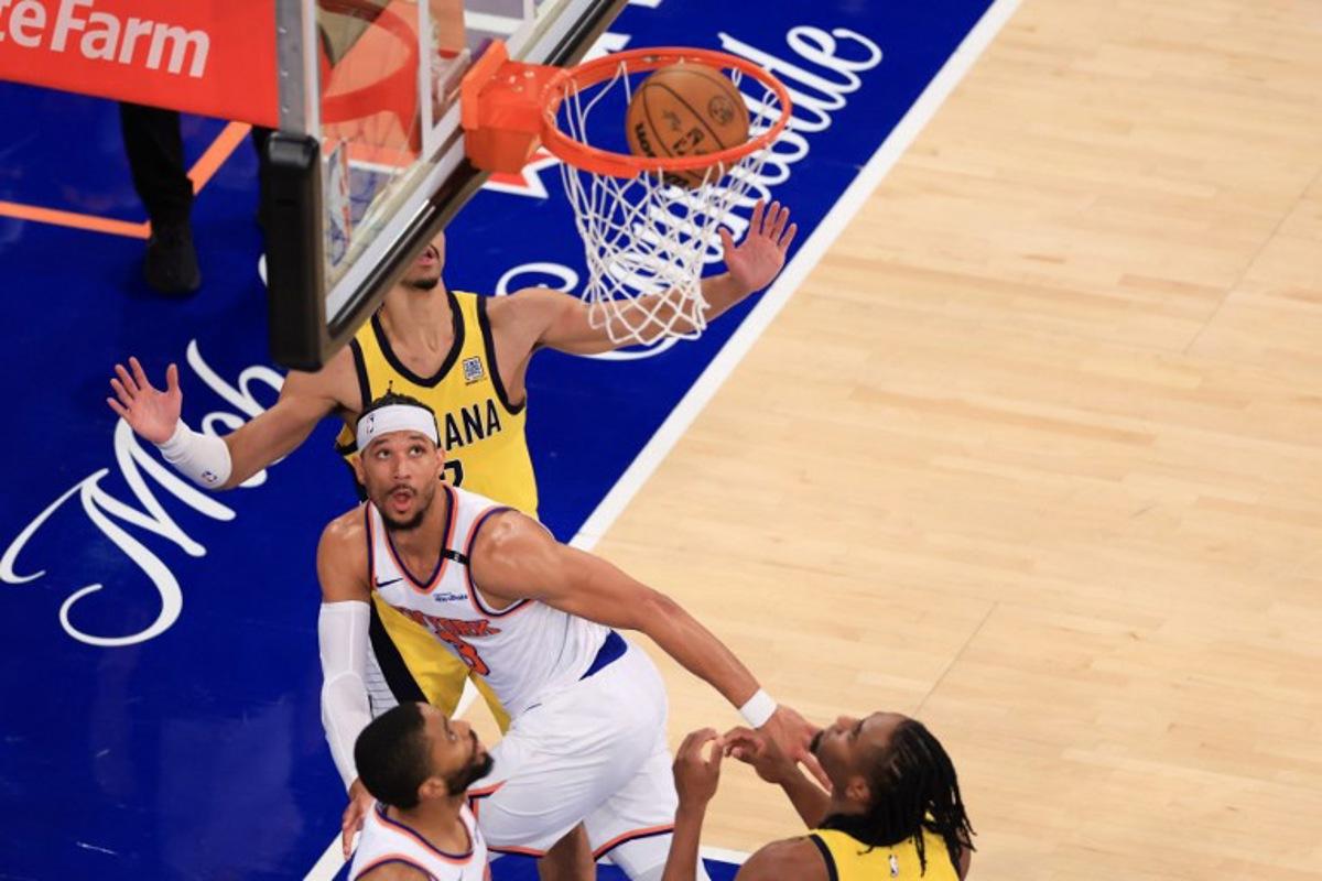 Knicks' shooting guard #03 Josh Hart (C) reacts after a basket during Game Five of the Eastern Conference Finals of the 2025 NBA Playoffs between the New York Knicks and the Indiana Pacers at Madison Square Garden in New York on May 29, 2025. CHARLY TRIBALLEAU / AFP