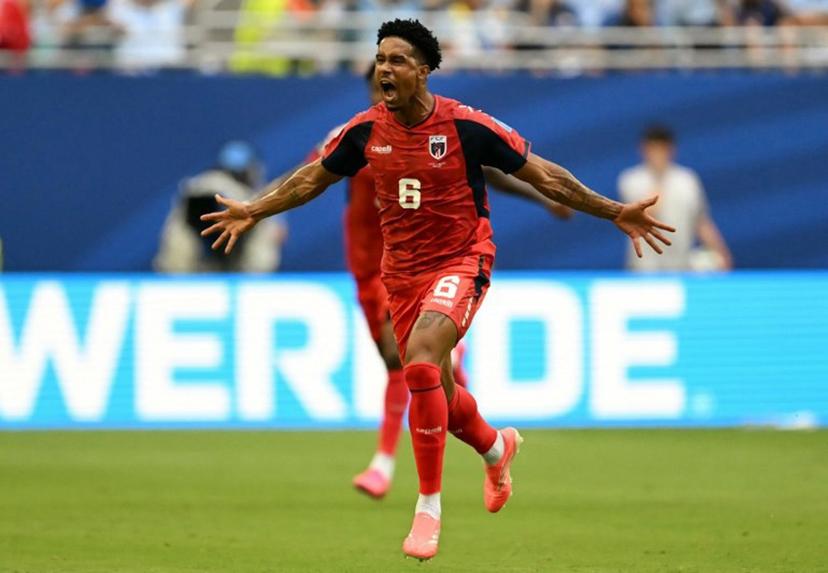 Cape Verde's midfielder #06 Kevin Pina celebrates after scoring his team's first goal during the 2026 World Cup Group H football match between Uruguay and Cape Verde at the Miami Stadium in Miami Gardens on June 21, 2026. CHANDAN KHANNA / AFP
