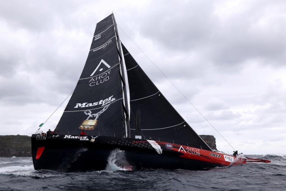 Yacht Master Lock Comanche sails at the start of the annual Sydney to Hobart yacht race on Boxing Day at Sydney Harbour on December 26, 2025. DAVID GRAY / AFP