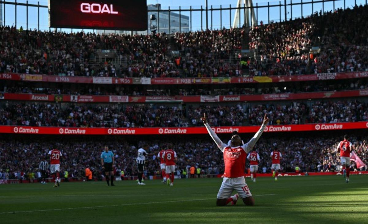 Arsenal's English midfielder #10 Eberechi Eze celebrates scoring the opening goal during the English Premier League football match between Arsenal and Newcastle United at the Emirates Stadium in London on April 25, 2026. Glyn KIRK / AFP