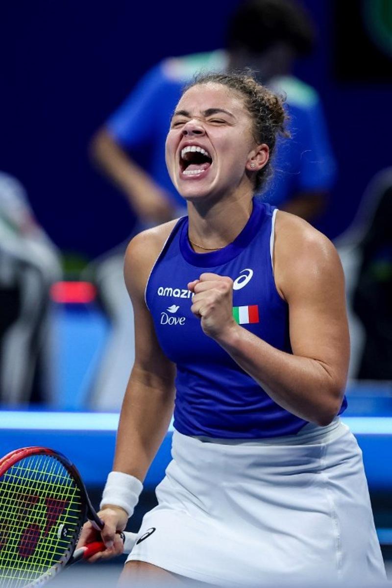 Italy's Jasmine Paolini reacts as she plays against Ukraine's Elina Svitolina during their second singles semi-final match at the Billie Jean King Cup in Shenzhen, southern China's Guangdong province on September 19, 2025. STR / AFP