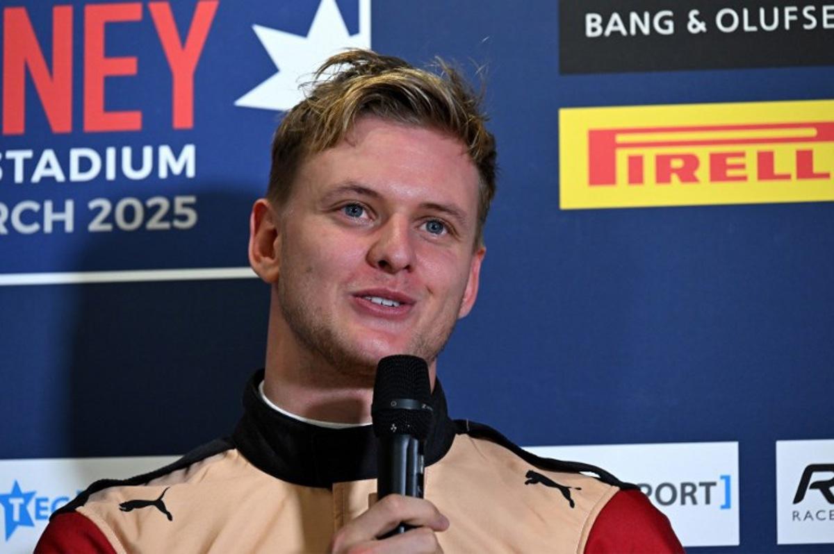 Former F1 driver and current WEC driver Mick Schumacher speaks during a press conference at Accor Stadium in Sydney on March 6, 2025, ahead of the Race of Champions Nations Cup. Saeed KHAN / AFP