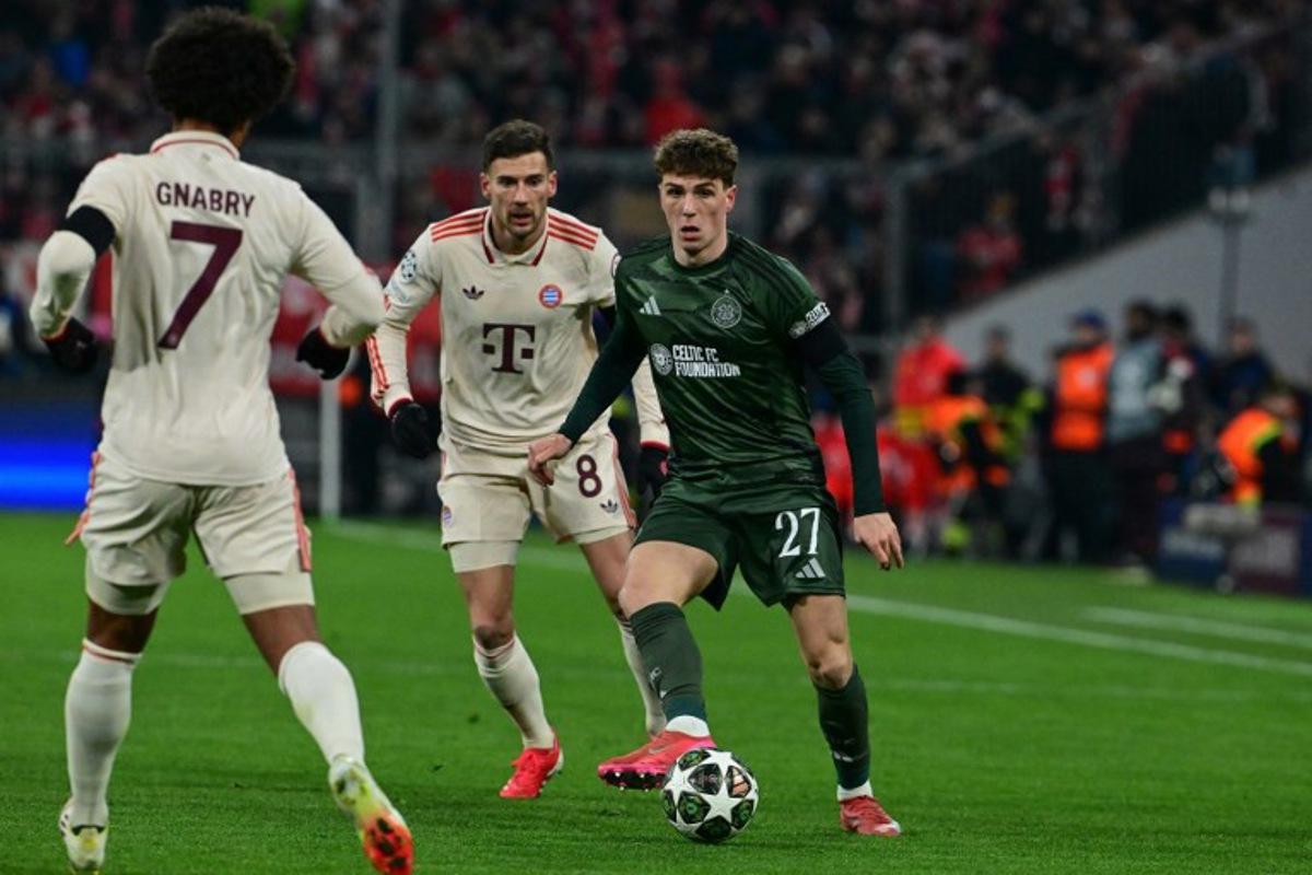 Celtic's Belgian midfielder #27 Arne Engels (R), Bayern Munich's German midfielder #08 Leon Goretzka and Bayern Munich's German forward #07 Serge Gnabry vie for the ball during the UEFA Champions League second-leg, knockout phase play-off match FC Bayern Munich vs Celtic on February 18, 2025 in Munich. Tobias SCHWARZ / AFP