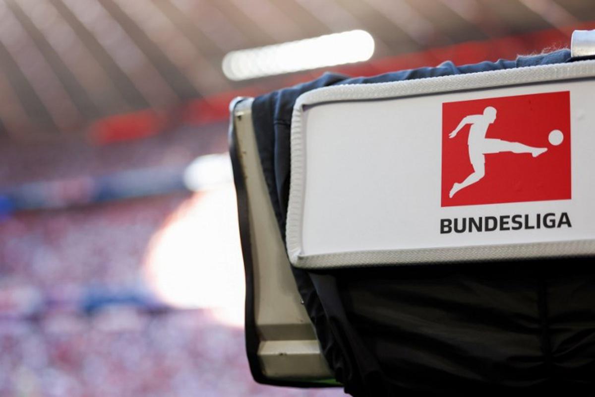 A TV camera with the Bundesliga logo is pictured during German first division Bundesliga football match between FC Bayern Munich and VfL Wolfsburg in Munich, southern Germany on May 12, 2024. Michaela STACHE / AFP