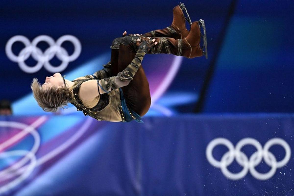 USA's Ilia Malinin competes in the figure skating men's singles short program during the Milano Cortina 2026 Winter Olympic Games at Milano Ice Skating Arena in Milan on February 10, 2026. Gabriel BOUYS / AFP