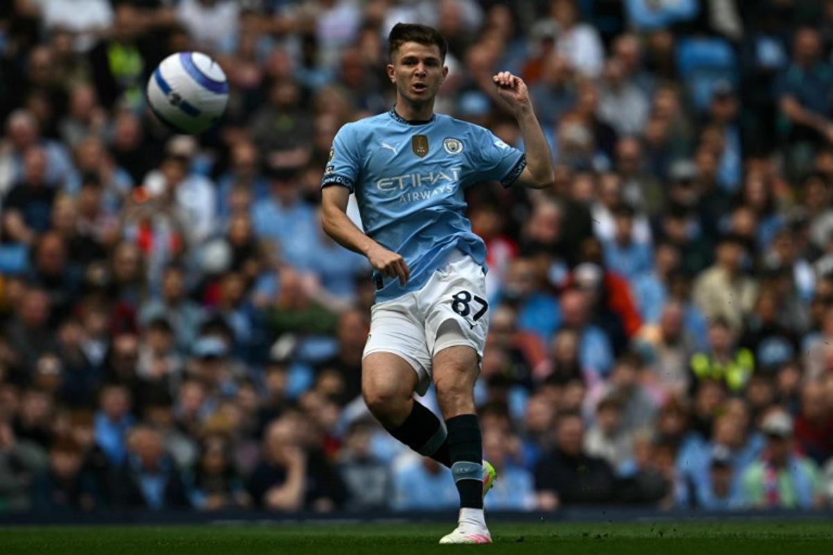 Manchester City's English midfielder #87 James McAtee has this shot saved during the English Premier League football match between Manchester City and Crystal Palace at the Etihad Stadium in Manchester, north west England, on April 12, 2025. Paul ELLIS / AFP