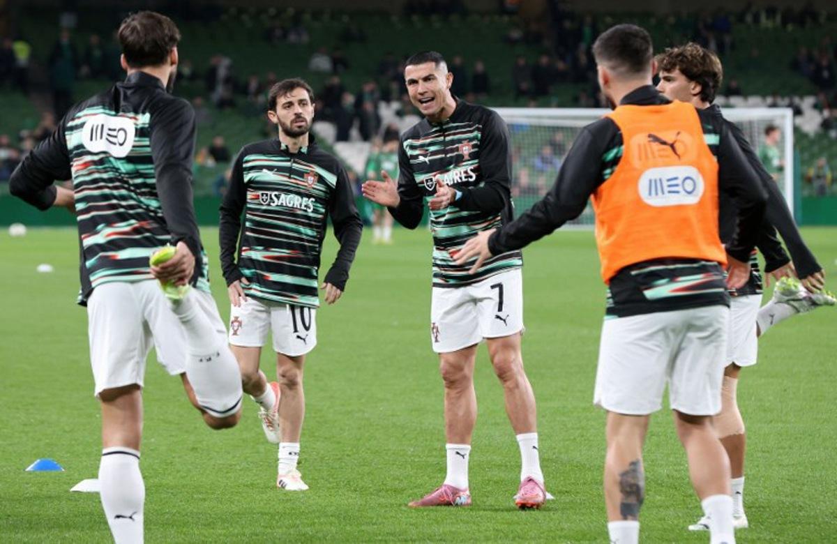 Portugal's forward Cristiano Ronaldo warms up ahead of during the men's football 2026 World Cup Group F qualifier between Ireland and Portugal at Aviva Stadium in Dublin on November 13, 2025. Paul Faith / AFP