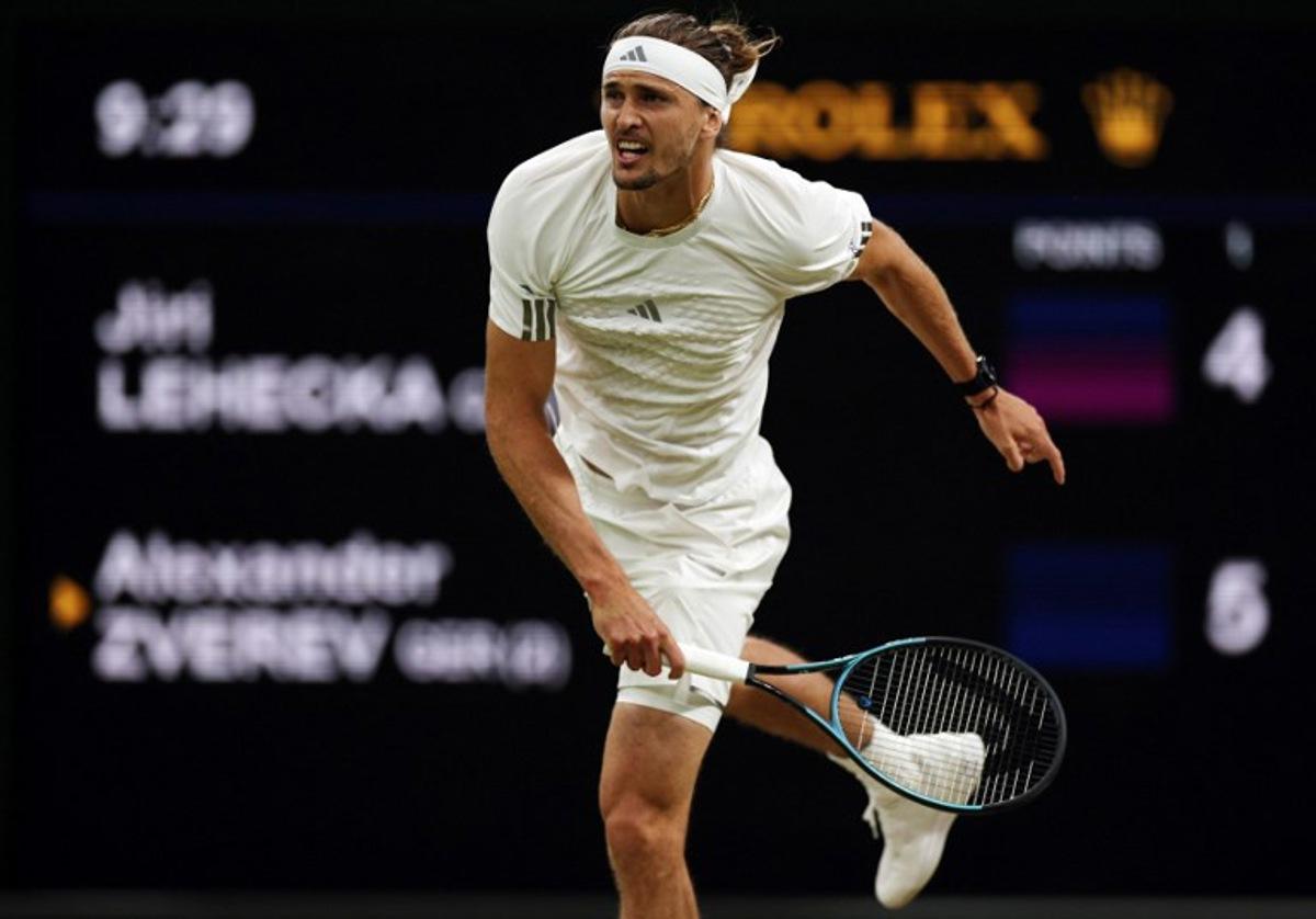 Germany's Alexander Zverev serves to Czech Republic's Jiri Lehecka during their men's singles round of 16 tennis match on the eighth day of the 2026 Wimbledon Championships at The All England Lawn Tennis and Croquet Club in Wimbledon, southwest London, on July 6, 2026. Adrian Dennis / AFP