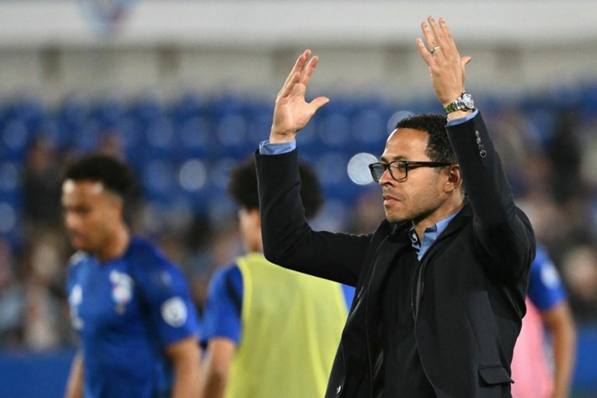 Strasbourg's English head coach Liam Rosenior gestures during the French L1 football match between RC Strasbourg Alsace and OGC Nice at the Stade de la Meinau in Strasbourg, eastern France, on April 12, 2025. SEBASTIEN BOZON / AFP