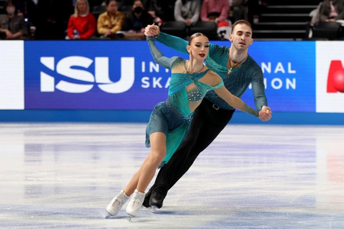 Georgia's Anastasiia Metelkina and Luka Berulava compete in the Senior Pairs Free Skating at the ISU Grand Prix of Figure Skating Final in Nagoya on December 5, 2025. PAUL MILLER / AFP