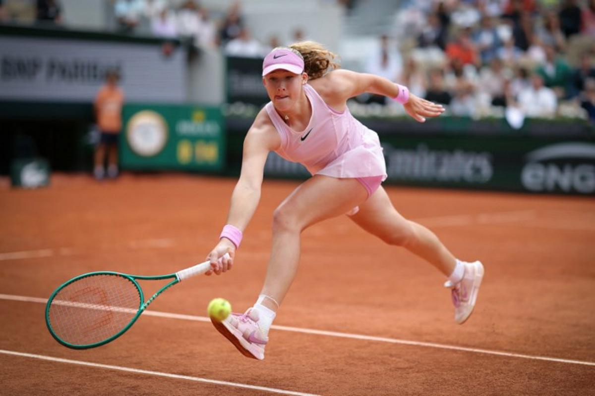Mirra Andreeva plays a forehand return to Switzerland's Jil Teichmann during their women's singles match on day 8 of the French Open tennis tournament on Court Suzanne-Lenglen at the Roland-Garros Complex in Paris on May 31, 2026. Thomas SAMSON / AFP