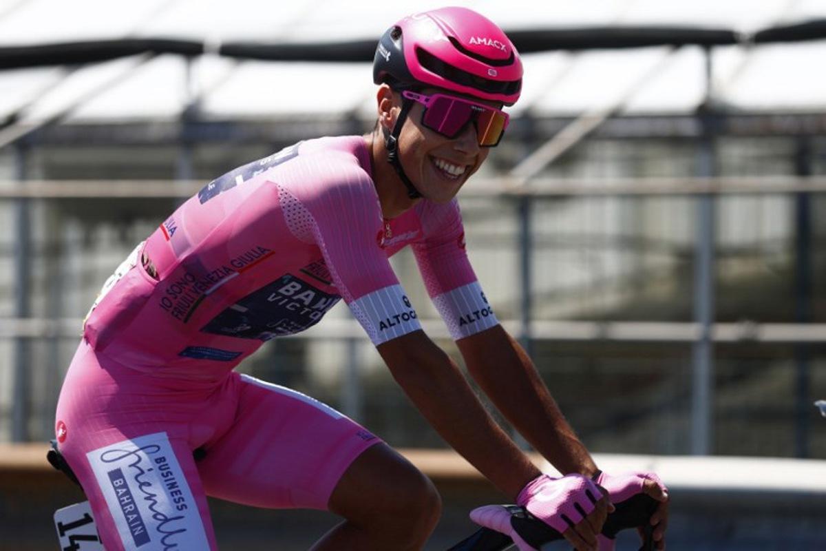 Pink jersey Bahrain - Victorious Portuguese rider Afonso Eulalio rides in the peloton during the 12th stage of the Giro d'Italia 2026 - Tour of Italy cycling race between Imperia and Novi Ligure, Italy, on May 21, 2026. Luca Bettini / AFP