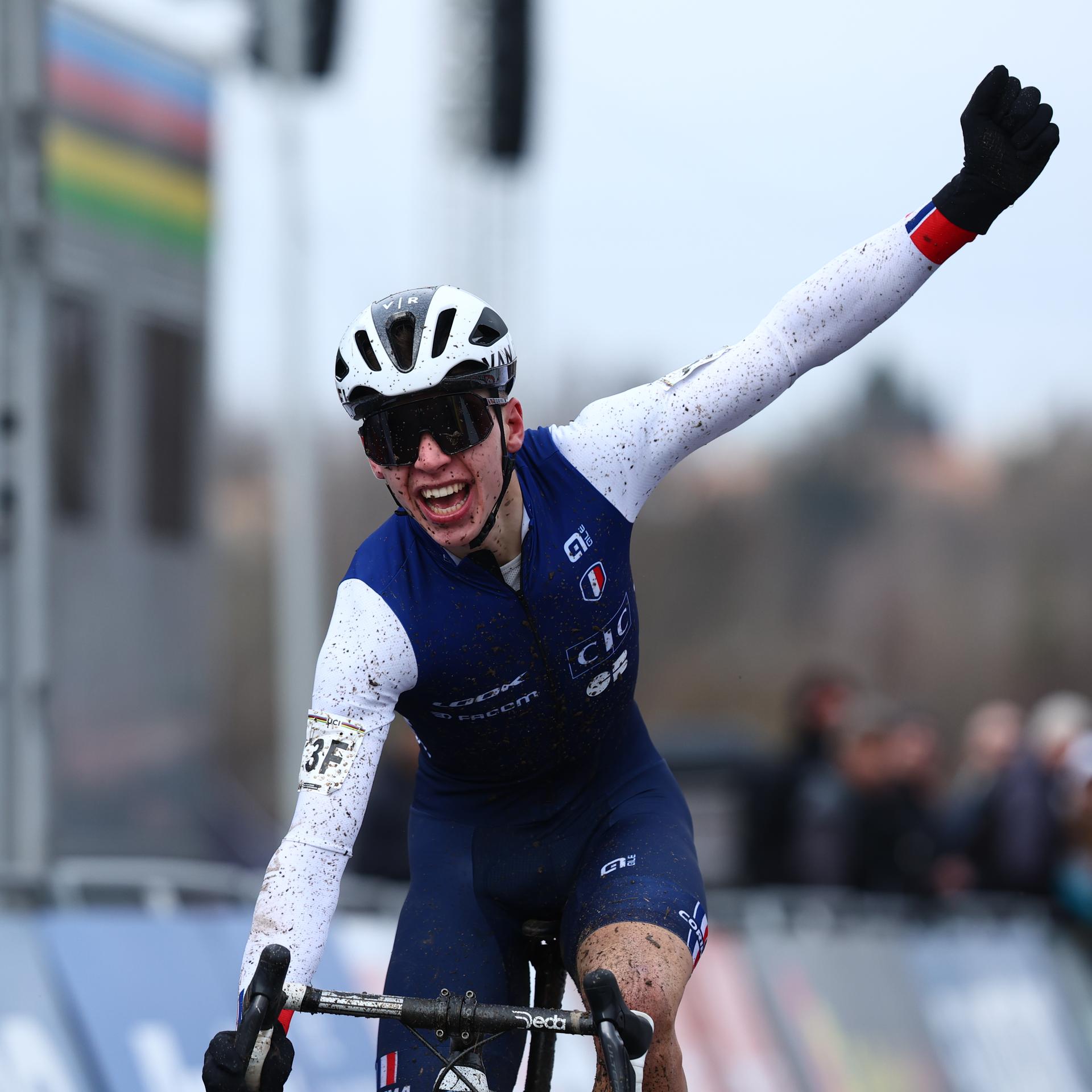 French Aubin Sparfel celebrates as he crosses the finish line to win the team relay event of the Cyclocross World Championships on Friday 02 February 2024 in Tabor, Czech Republic. BELGA PHOTO DAVID PINTENS