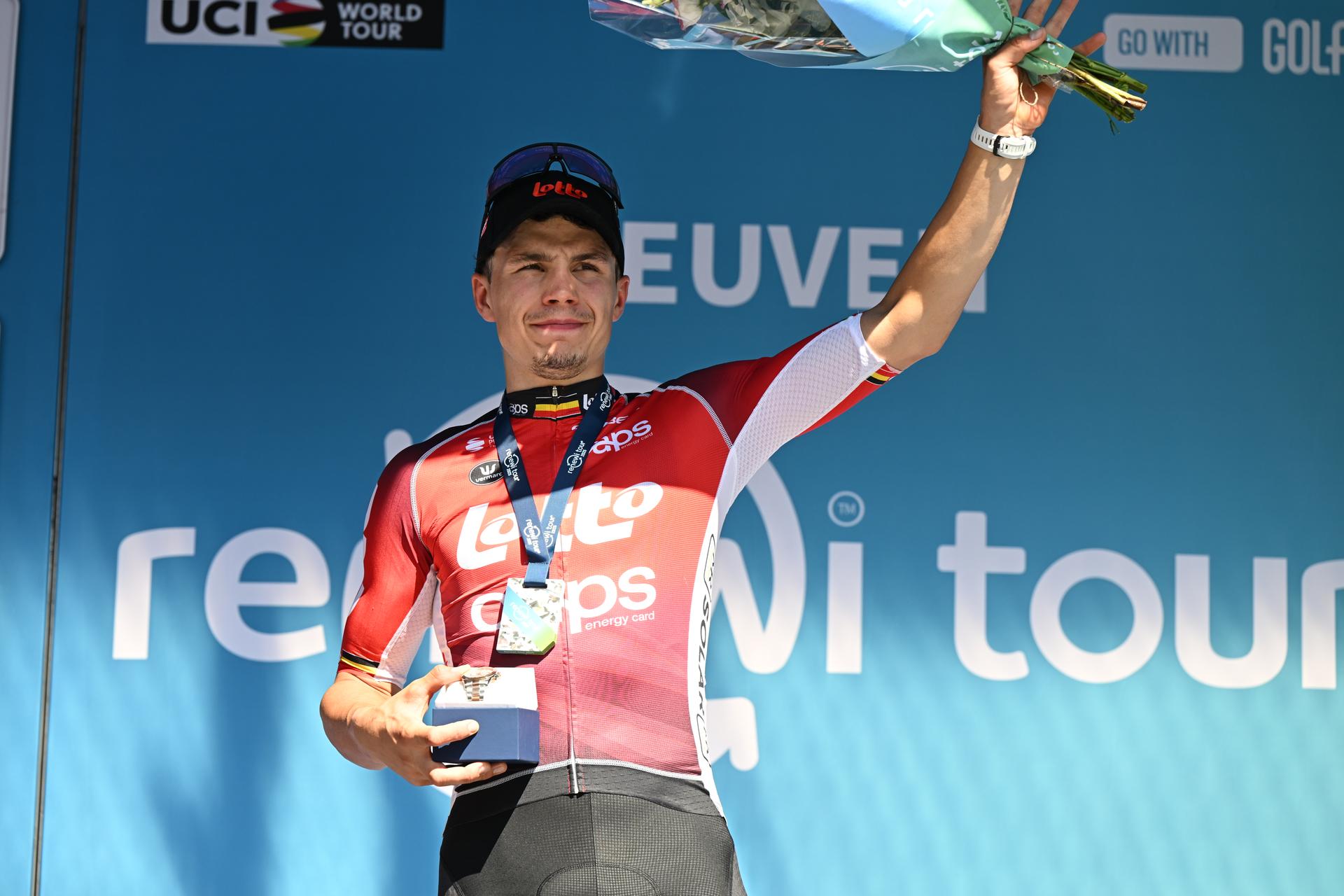 Belgian Arnaud De Lie of Lotto Cycling Team celebrates on the podium after winning the fifth and last stage of the 'Renewi Tour' multi-stage cycling race, 185km from and to Leuven on Sunday 24 August 2025. The five-day race takes place in Belgium and the Netherlands. BELGA PHOTO DAVID PINTENS