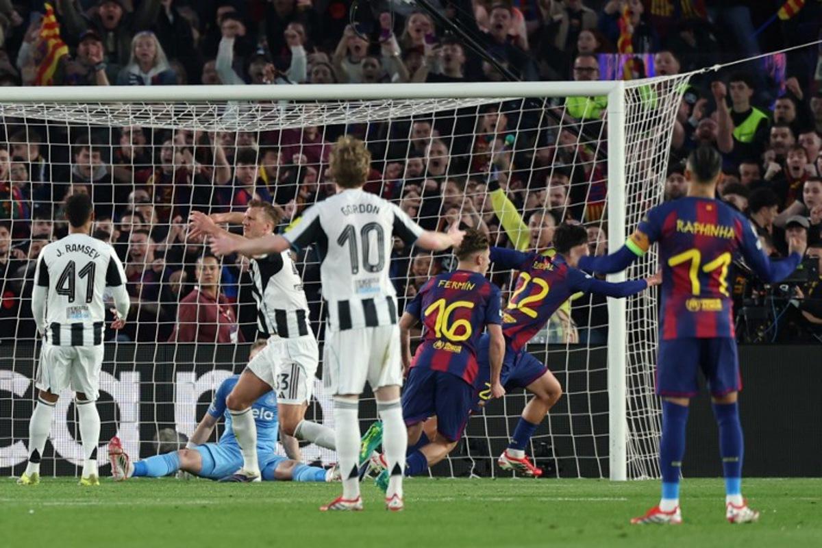 Barcelona's Spanish midfielder #22 Marc Bernal celebrates scoring his team0's second goal during the UEFA Champions League last 16 second leg football match between FC Barcelona and Newcastle United at the Camp Nou stadium in Barcelona, on March 18, 2026. Lluis GENE / AFP