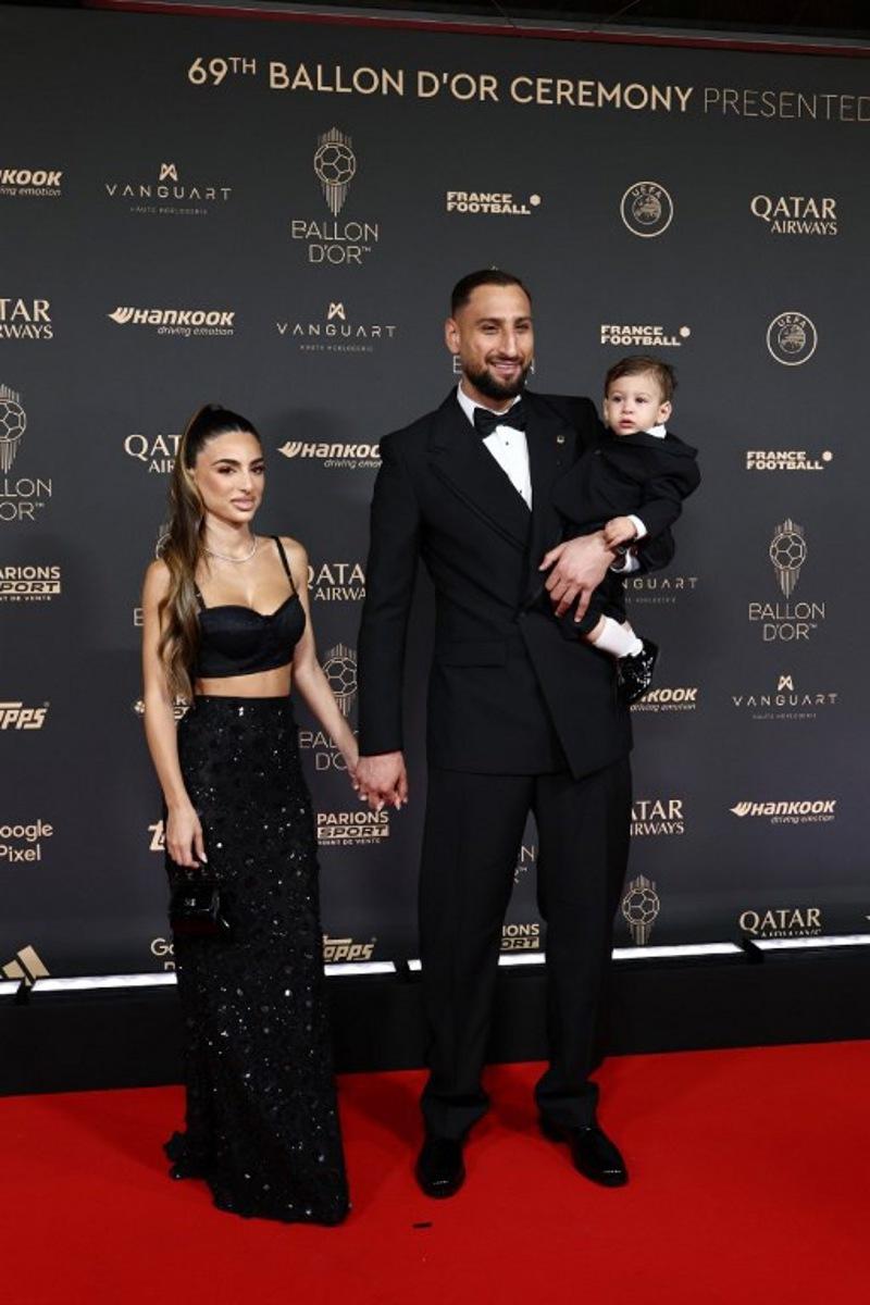 Italy's goalkeeper Gianluigi Donnarumma poses with his wife Alessia Elefante upon arrival before the 2025 Ballon d'Or France Football award ceremony at the Theatre du Chatelet in Paris on September 22, 2025. FRANCK FIFE / AFP