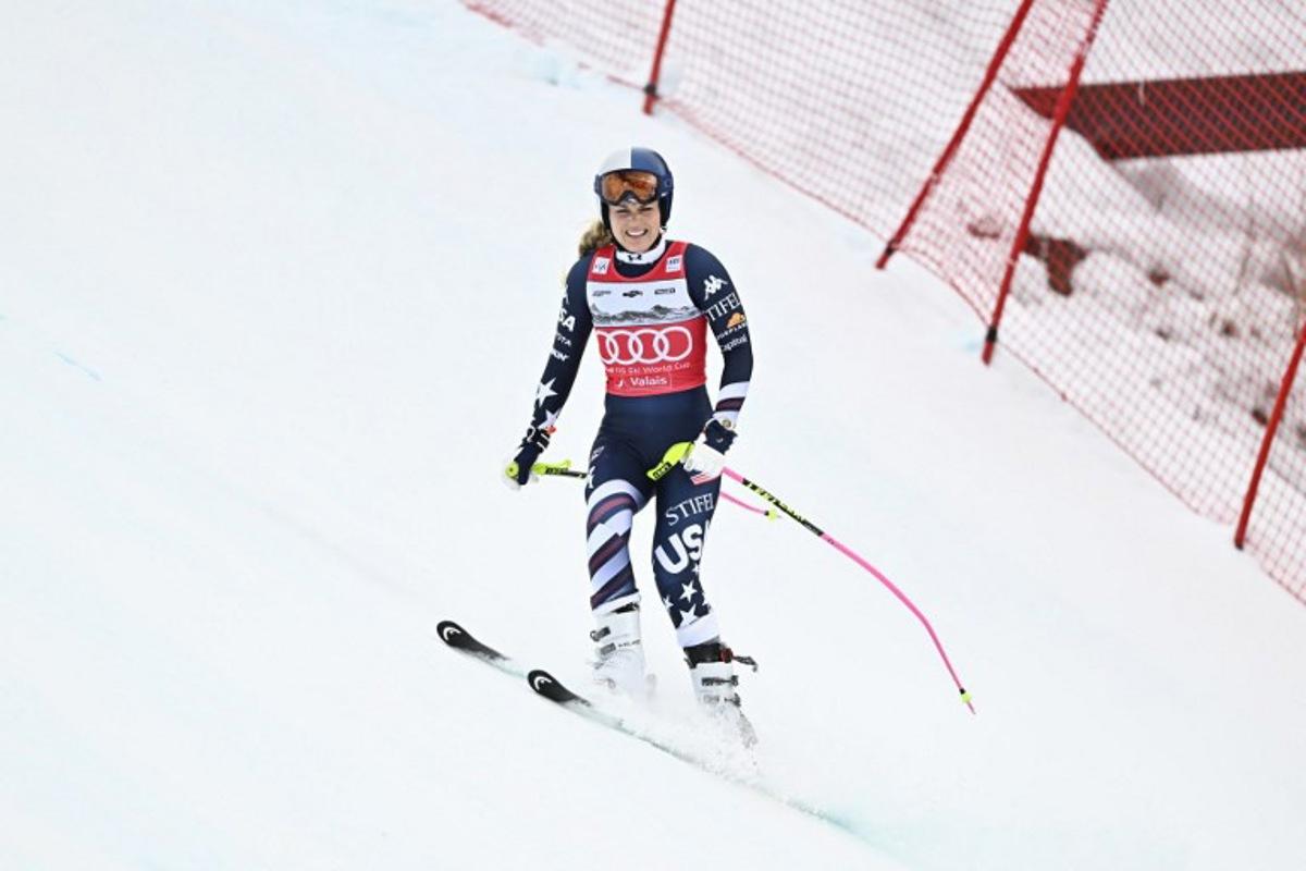 US' Lindsey Vonn reacts after crashing as she competes in the women's downhill race part of the FIS Alpine Ski World Cup 2025-2026, in Crans Montana, Switzerland, on January 30, 2026. Fabrice COFFRINI / AFP