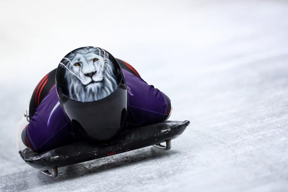 Belgium's Kim Meylemans takes part in the skeleton women's training session at Cortina Sliding Centre during the Milano Cortina 2026 Winter Olympic Games in Cortina d'Ampezzo on February 9, 2026. FRANCK FIFE / AFP
