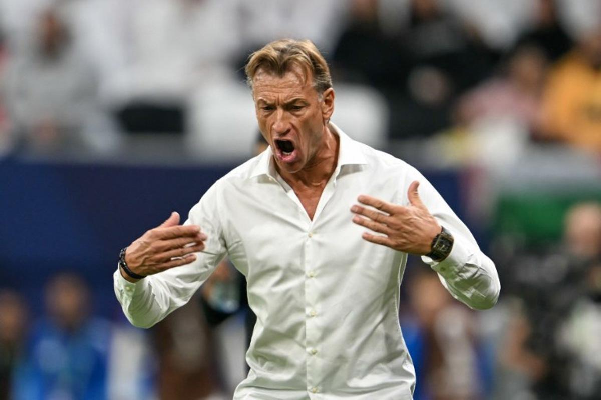 Saudi Arabia's French head coach Herve Renard reacts during the FIFA Arab Cup 2025 semi-final football match between Saudi Arabia and Jordan at the Al-Bayt Stadium in Al-Khor on December 15, 2025. Mahmud HAMS / AFP
