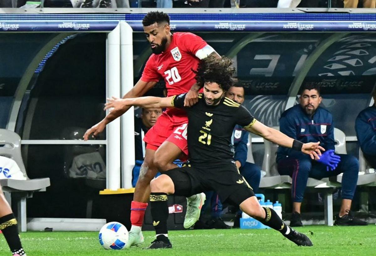 Panama's midfielder #20 Anibal Godoy and Mexico's forward #21 Cesar Huerta vie for the ball during the CONCACAF Nations League final football match between Mexico and Panama at SoFi Stadium in Inglewood, California, on March 23, 2025. Frederic J. Brown / AFP