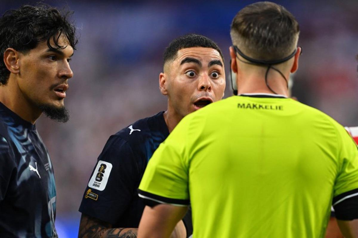 Paraguay's midfielder #10 Miguel Almiron reacts in front of Dutch referee Danny Makkelie during the 2026 World Cup Group D football match between USA and Paraguay at the Los Angeles Stadium in Inglewood on June 12, 2026. Patrick T. Fallon / AFP