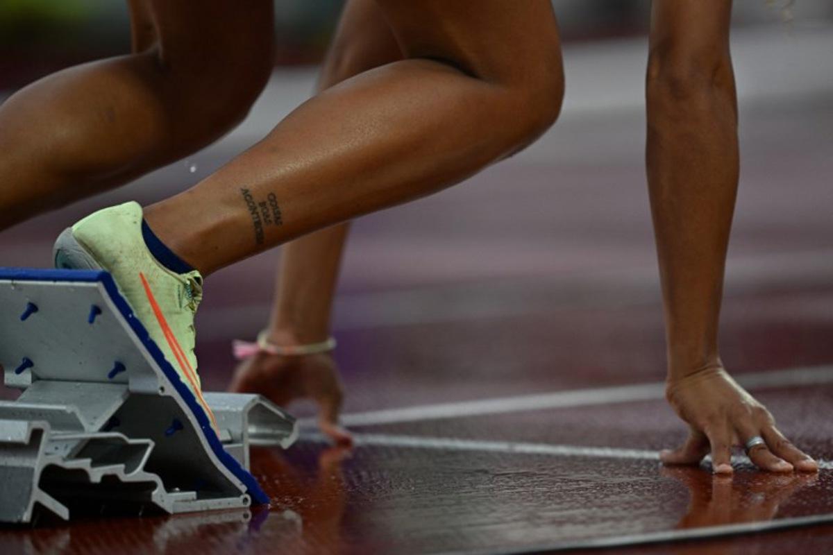 Brazil's Marlene Ewellyn Silva Dos Santos competes in the women's 400m hurdles semifinal of the Pan American Games Santiago 2023 at the National Stadium in Santiago, on November 1st, 2023. MAURO PIMENTEL / AFP