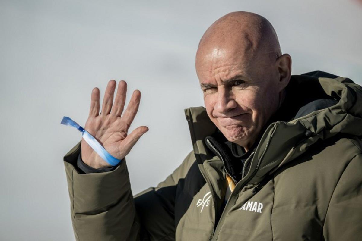FIS President Johan Eliasch waves at the end of the FIS Alpine Ski World Cup 2025-2026, in St Moritz, south-eastern Switzerland on December 13, 2025. Fabrice COFFRINI / AFP