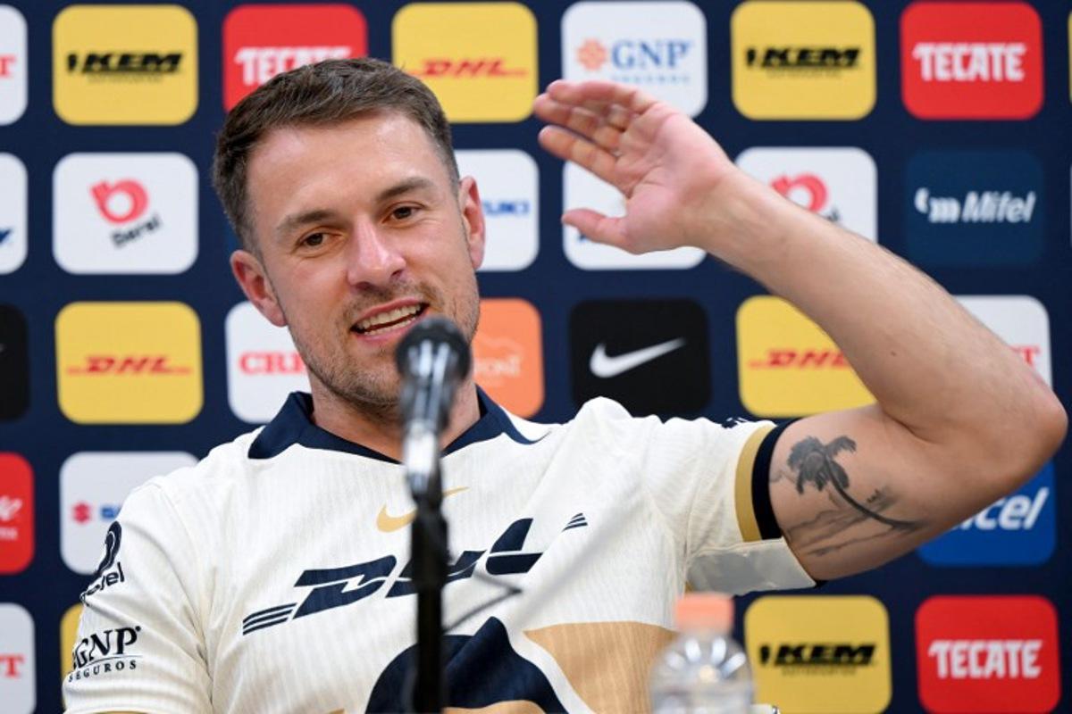 Pumas' Welsh midfielder Aaron Ramsey speaks during a press conference in Mexico City on July 3, 2025. Ramsey was introduced on July 3, 2025 as a new player of Pumas of the National Autonomous University of Mexico (UNAM) of Mexican football, starting from the Liga MX Apertura tournament that will begin on July 11. Yuri CORTEZ / AFP