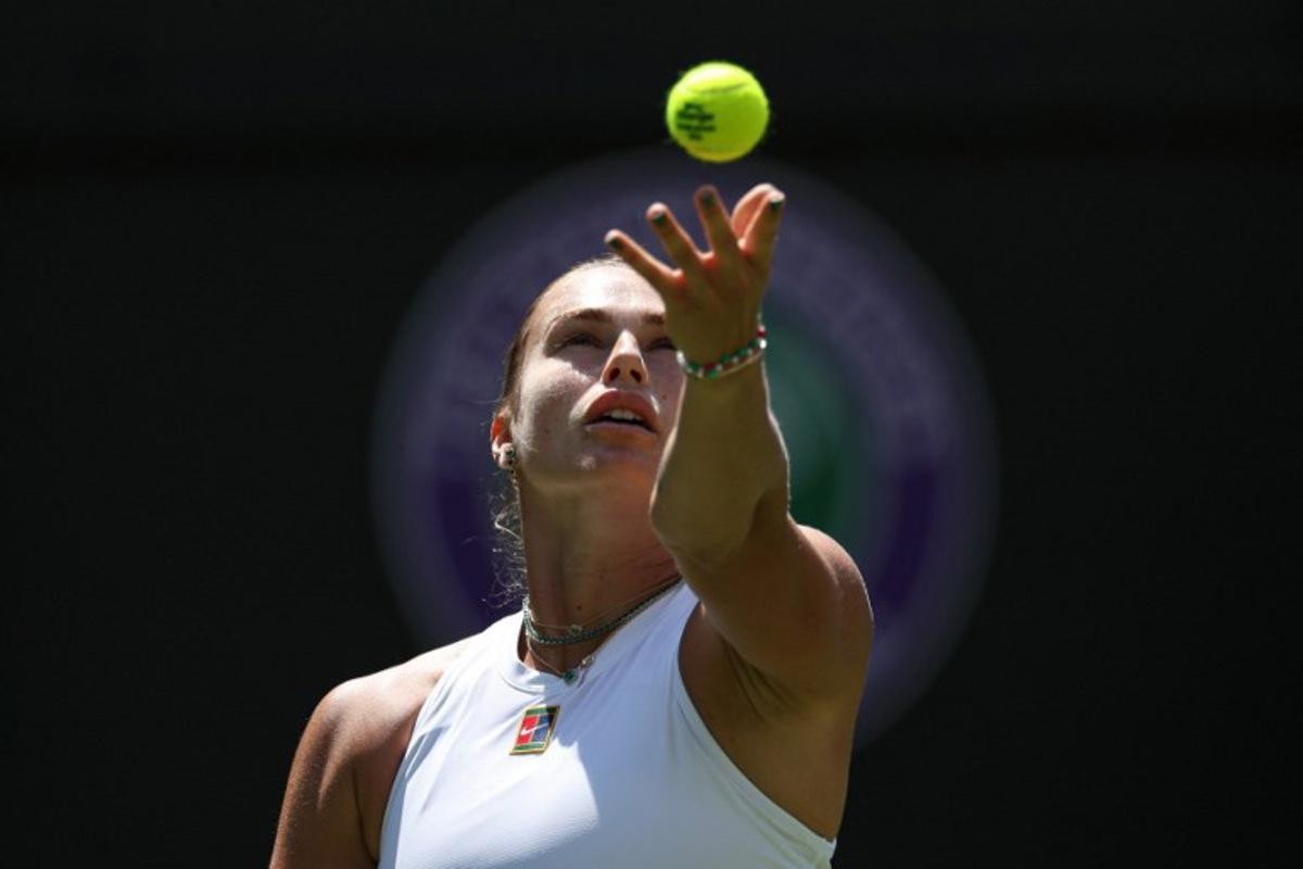 Belarus's Aryna Sabalenka serves to US-Canada's Carson Branstine during their women's singles first round tennis match on the first day of the 2025 Wimbledon Championships at The All England Lawn Tennis and Croquet Club in Wimbledon, southwest London, on June 30, 2025. Adrian Dennis / AFP