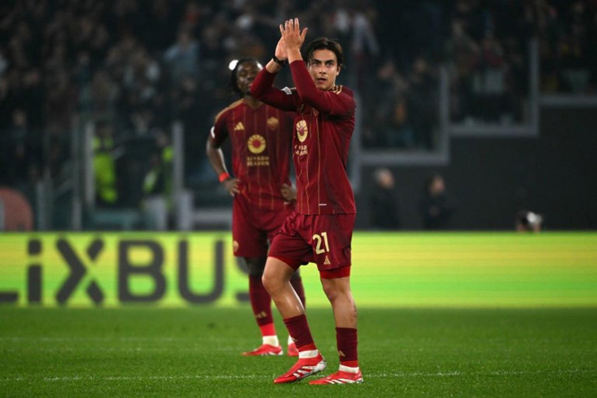 Roma's Argentine forward #21 Paulo Dybala leaves the pitch during the UEFA Europa League knockout round play-off 2nd leg football match between AS Roma and FC Porto at the Olympic stadium in Rome, on February 20, 2025. Alberto PIZZOLI / AFP