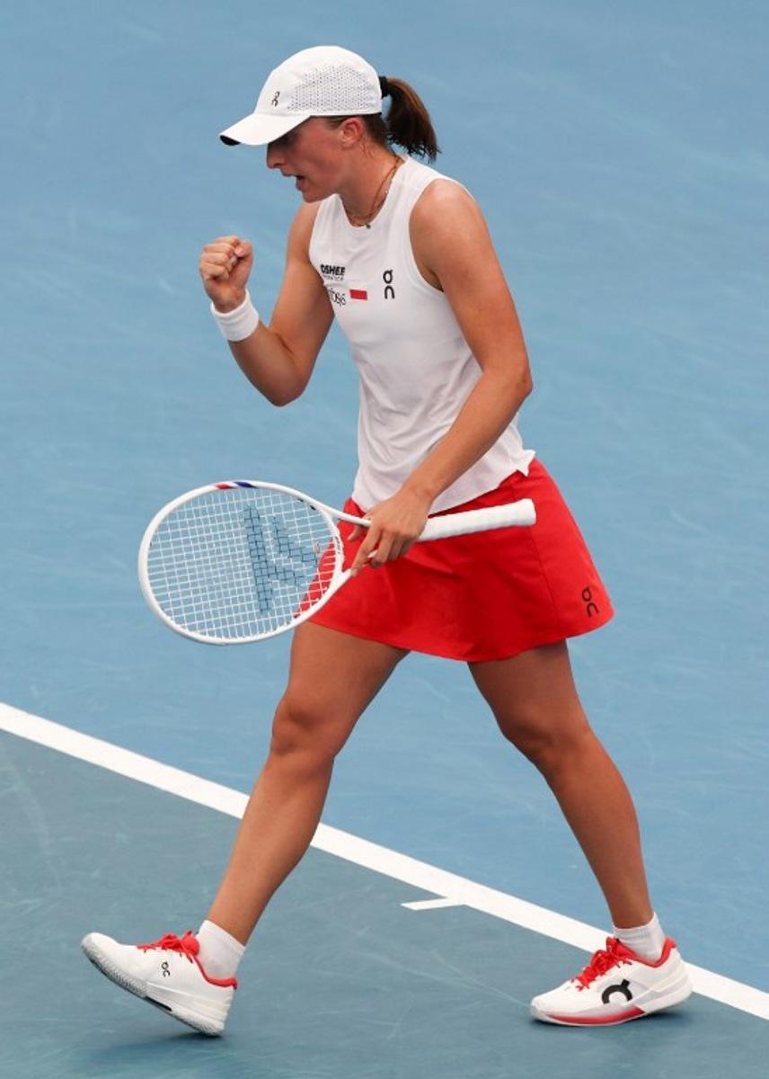 Poland's Iga Swiatek celebrates victory against Netherlands' Suzan Lamens after her women's singles match at the United Cup tennis tournament in Sydney on January 7, 2026. Izhar KHAN / AFP