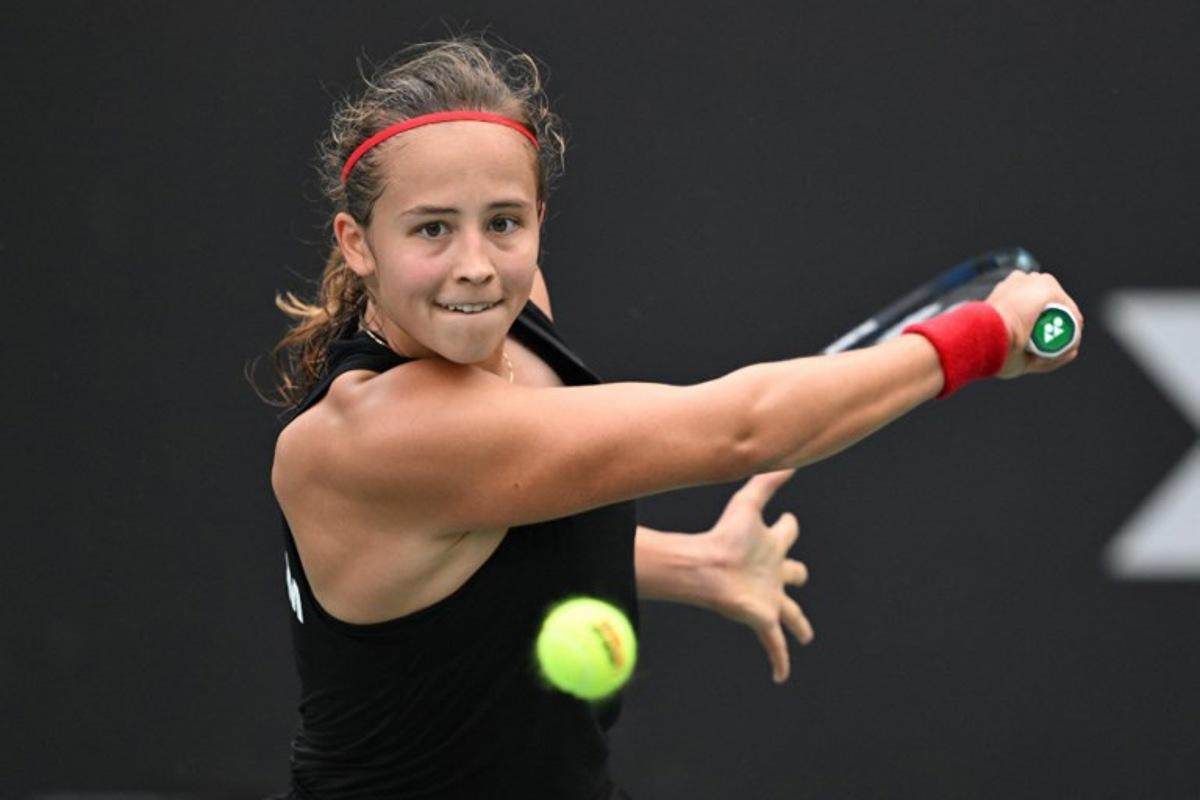 Belgium's Hanne Vandewinkel hits a return to China's Wei Sijia during their women's singles match at the Billie Jean King Cup tennis play-offs at the Guangzhou Nansha International Tennis Center in Guangzhou, in south China's Guangdong province on November 17, 2024. STR / AFP