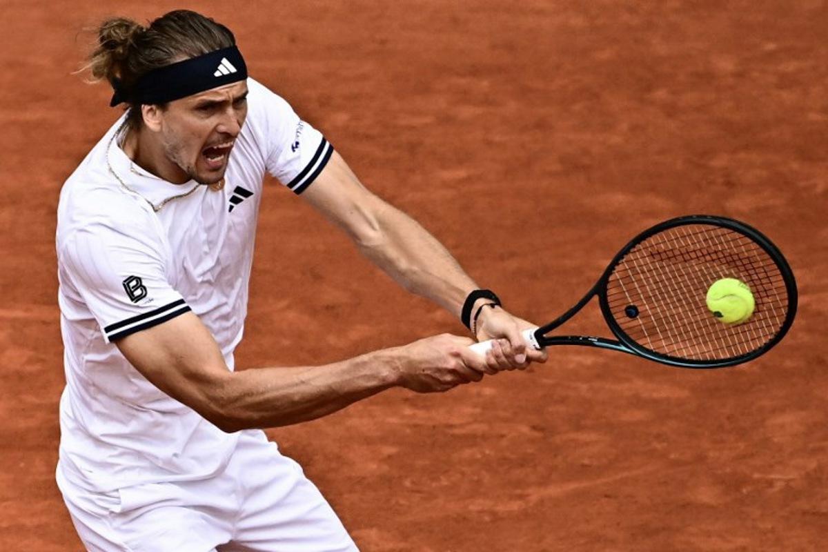 Germany's Alexander Zverev plays a backhand return to Netherlands' Jesper de Jong during their men's singles match on day 8 of the French Open tennis tournament on Court Philippe-Chatrier at the Roland-Garros Complex in Paris on May 31, 2026. JULIEN DE ROSA / AFP