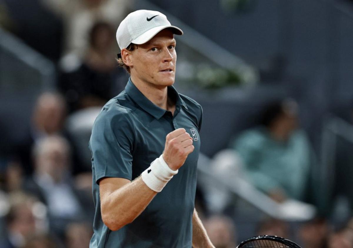 Italy's Jannik Sinner celebrates beating Spain's Rafael Jodar during their 2026 ATP Tour Madrid Open tennis tournament quarterfinal singles match at the Caja Magica in Madrid, on April 29, 2026. OSCAR DEL POZO / AFP