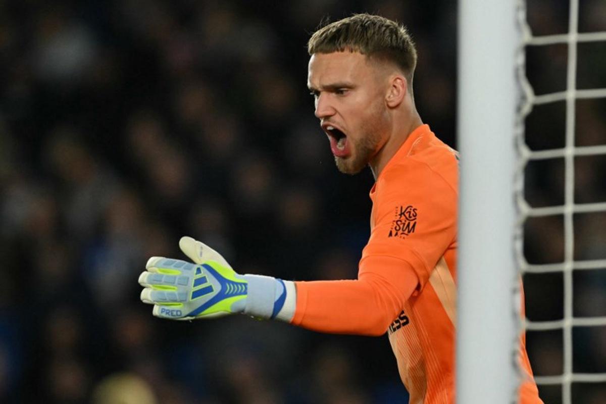 Brighton's Dutch goalkeeper #01 Bart Verbruggen shouts instructions during the English Premier League football match between Brighton and Hove Albion and Chelsea at the American Express Community Stadium in Brighton, southern England on April 21, 2026. Glyn KIRK / AFP