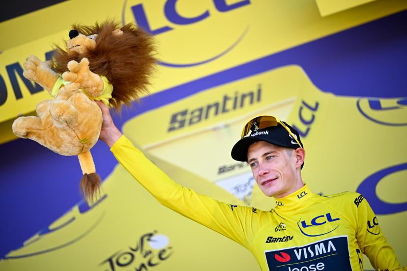 Danish Jonas Vingegaard of Team Visma-Lease a Bike celebrates on the podium in the yellow jersey of leader in the overall ranking after the first stage of the 2026 Tour de France cycling race, a team time trial of 19km with start and finish in Barcelona, Spain, Saturday 04 July 2026. The 113th edition of the Tour de France starts on Saturday 4 July in Barcelona, Spain, and will finish in Paris, France on the 26th of July. BELGA PHOTO JASPER JACOBS