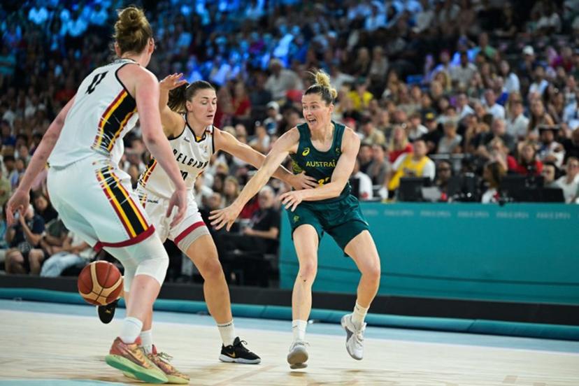 Australia's #32 Sami Whitcomb (R) passes the ball past Belgium's #10 Laure Resimont (C) in the women's Bronze Medal basketball match between Belgium and Australia during the Paris 2024 Olympic Games at the Bercy Arena in Paris on August 11, 2024. Damien MEYER / AFP