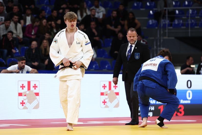 Belgian Jarne Duyck (white gi) competes against Israeli Reem Fridman Zilberstein (blue gi) in the first round of the men -90kg competition, at the European Championships judo in Tbilisi, Georgia, on Saturday 18 April 2026. BELGA PHOTO NIKOLA KRISTC