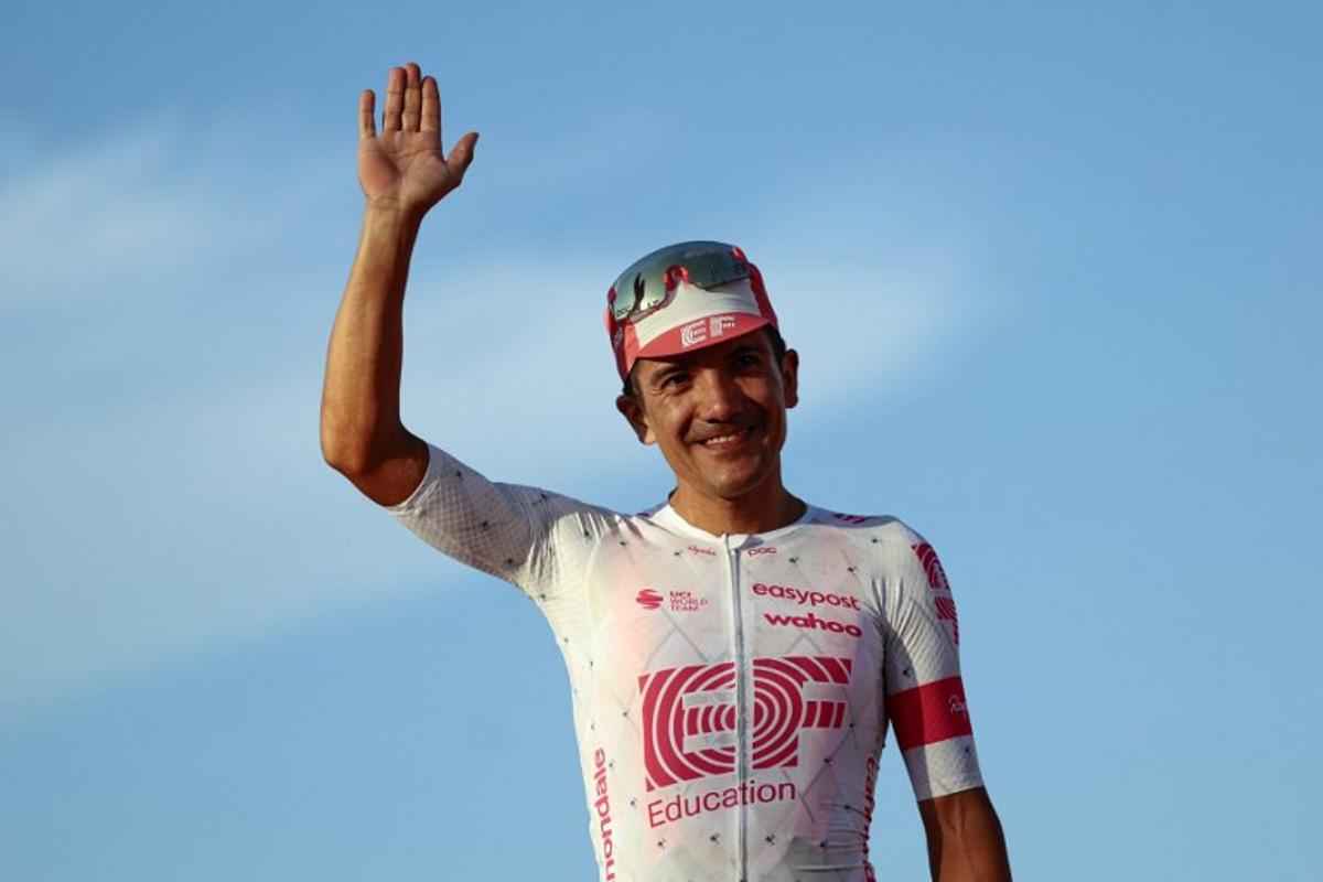 Third placed EasyPost's Ecuadorian rider Richard Carapaz celebrates on the podium after the 21st and last stage of the 108th Giro d'Italia cycling race of 143kms from Rome to Rome on June 1, 2025. Luca Bettini / AFP