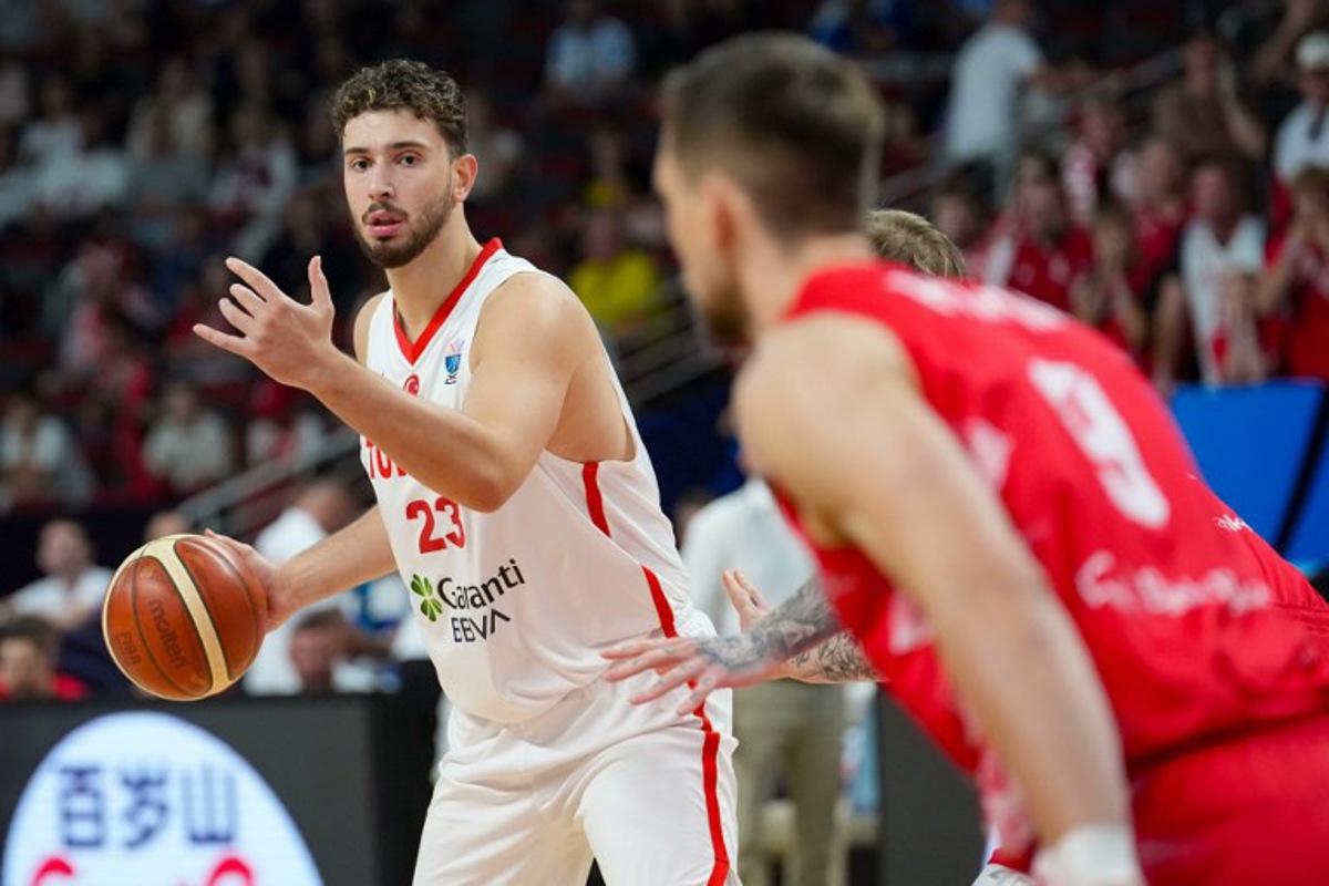 Turkey's power forward #23 Alperen Sengun vie during the FIBA EuroBasket 2025 quarter-final basketball match between Turkey and Poland in Riga, Latvia, on September 9, 2025. Gints Ivuskans / AFP