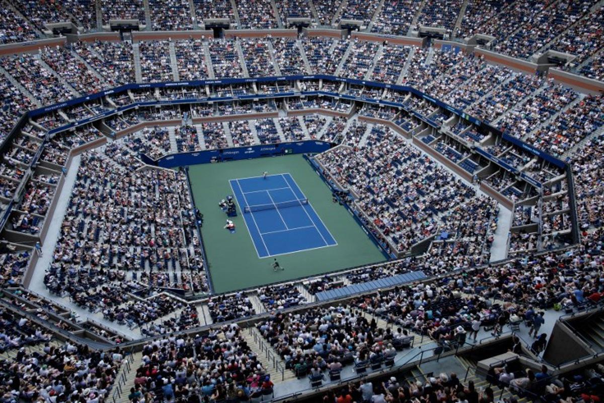 An overall view inside Arthur Ashe Stadium as Italy's Jannik Sinner and Australia's Christopher O'Connell play during their men's singles third round match on day six of the US Open tennis tournament at the USTA Billie Jean King National Tennis Center in New York City, on August 31, 2024. KENA BETANCUR / AFP